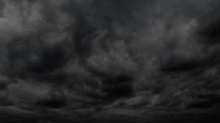dark dramatic sky with stormy clouds before rain or snow as abstract background, extreme weather