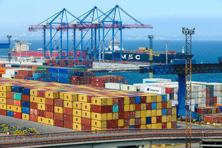 seaport, Odessa, Ukraine, May 4, 2019 - view of the commercial industrial seaport, infrastructure, warehouses with containers, loading and unloading for international transportation by trucks and ships, logistics hubのeditorial素材