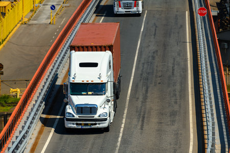 seaport, Odessa, Ukraine, May 4, 2019 - truck transports container through industrial seaport,...