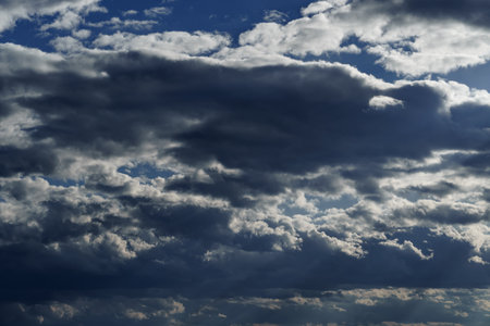 storm sky, dark dramatic clouds during thunderstorm, rain and wind, extreme weather, abstract...