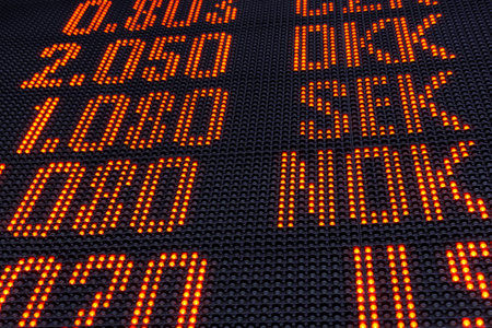 digital scoreboard with currency names and numbers for the exchange rate of financial transactions and exchangesの写真素材