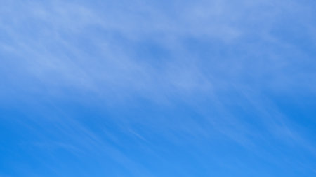beautiful blue sky with soft white clouds for abstract backgroundの写真素材