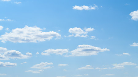 beautiful blue sky with soft white clouds for abstract backgroundの写真素材