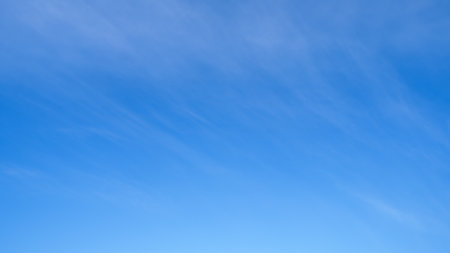 beautiful blue sky with soft white clouds for abstract backgroundの写真素材