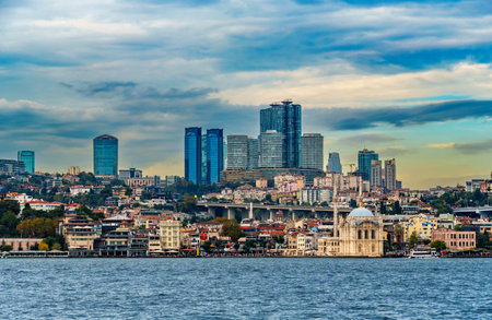 view from a pleasure boat on the Bosphorus and the cityscape of Istanbul, Turkey, the modern architecture of the city, a popular tourist destination.の写真素材