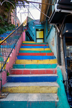the staircase is painted in different colors, the steps are a door, bright colorsの写真素材
