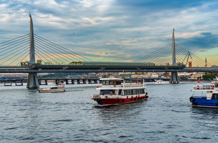 view from a pleasure boat on the Bosphorus and the cityscape of Istanbul, Turkey, the architecture of the city at sunset, a popular tourist destination.の写真素材