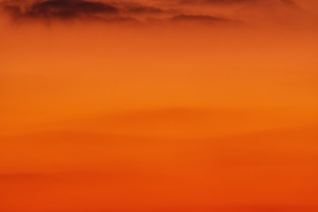 beautiful sunset sky with red sunlight as abstract background.