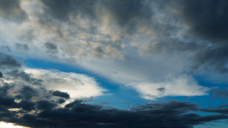 beautiful blue sky with dramatic clouds for abstract background.の写真素材