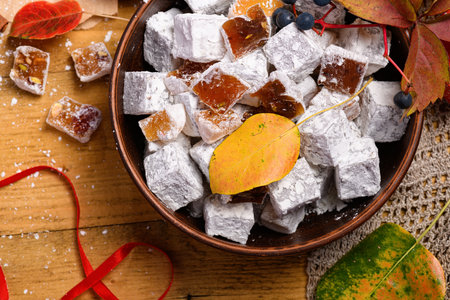 Sweet food Turkish delight on wooden background, assorted locum and candy as decorated backdropの写真素材