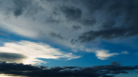 beautiful blue sky with dramatic clouds for abstract background.の写真素材