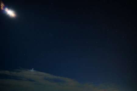 starry sky and moon at dusk as an abstract background.