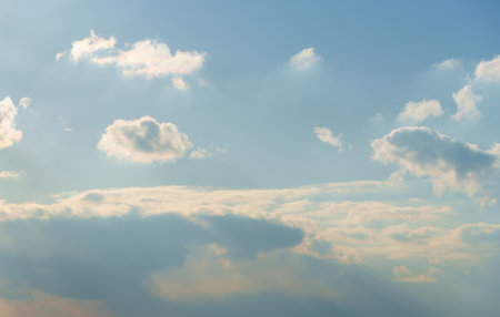 beautiful blue sky with soft white clouds for abstract background.の写真素材