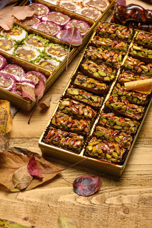 Sweet food Turkish delight on wooden background, assorted locum and candy for decorated backdrop.の写真素材