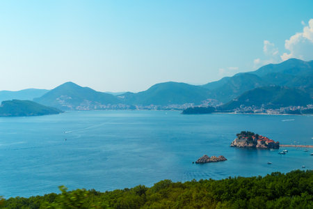 panorama of Adriatic sea and small city, beautiful nature, summer travel and vacation conceptの写真素材