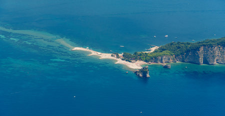 aerial view of the beach and the Adriatic Sea coast, St. Nicholas Island near Budva, Montenegro, airplane viewの写真素材