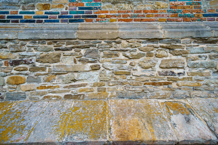 old stone wall as abstract backgroundの写真素材