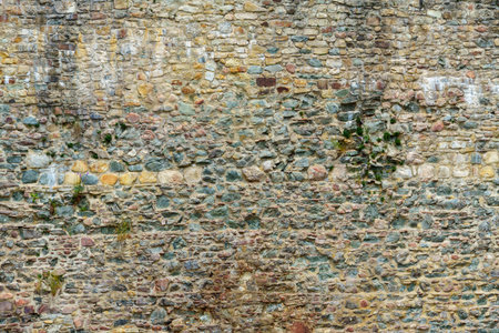 old stone wall as abstract backgroundの写真素材