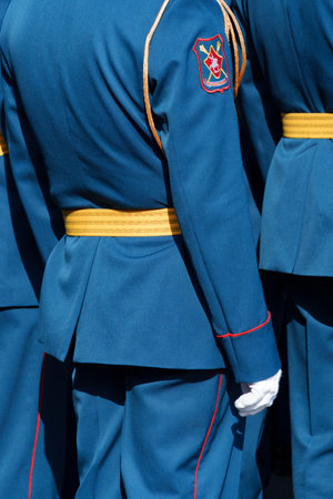 A soldier in formal uniform stands in formation during a paradeの写真素材