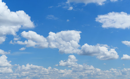 A beautiful blue sky with soft white clouds for abstract background