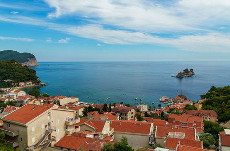 Top view of beautiful seascape and panorama of Petrovac city, Montenegro. Beautiful coast, city architecture and beach, islands. Yachts in the Adriatic Seaの写真素材