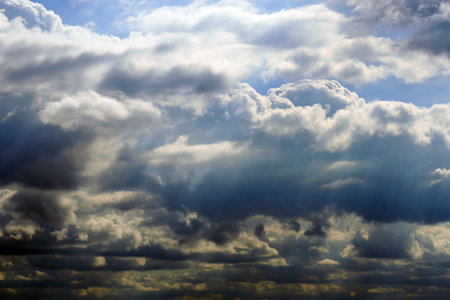 dark dramatic sky with stormy clouds before rain as abstract background, cloudy weatherの写真素材