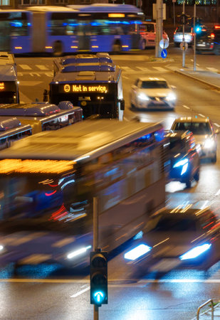 city streets and road traffic in Budapest, Hungary, at night. Street lights and peopleの写真素材