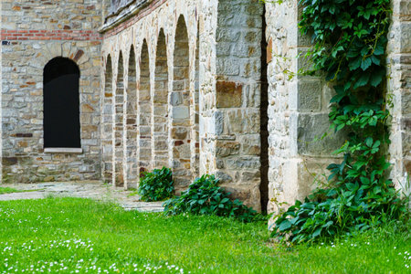 close up of architectural details, old stone wall with arches and doorsの写真素材