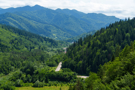 beautiful panoramic view of the Carpathian Mountains from height of the damの写真素材
