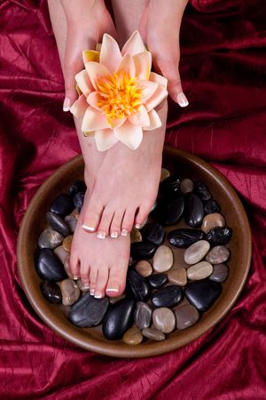 Hands and feet of a female being pamperedの写真素材