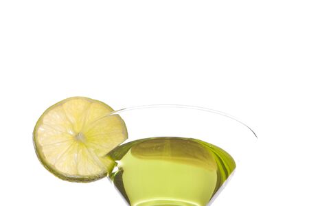Green martini with a slice of limeの写真素材
