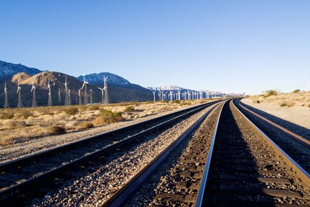 Wind turbine farm along the desert roadの写真素材