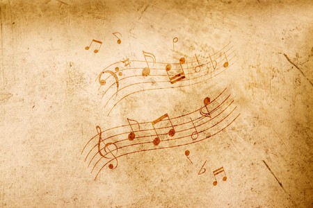 Music notes on grungy looking antique backgroundの写真素材