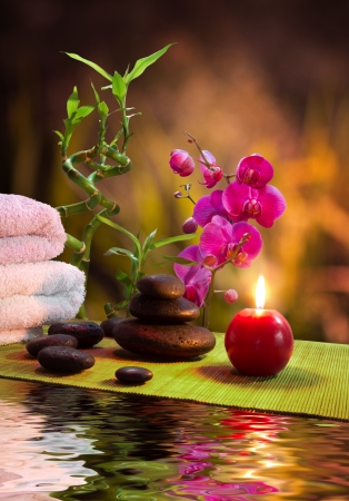 massage - bamboo - orchid, towels, candles , stones-vertical の写真素材