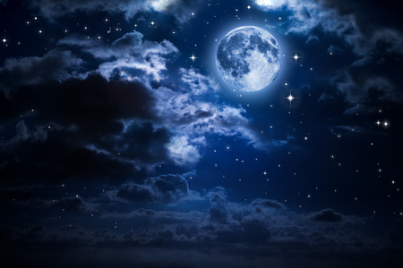 moon and clouds in the night の写真素材