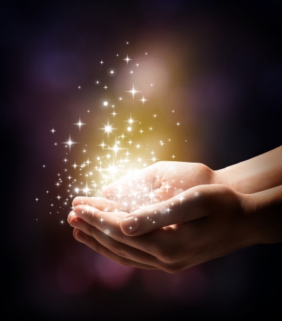 stardust and magic in your hands の写真素材