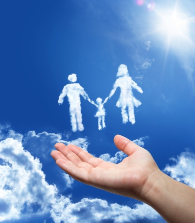 Family dreaming - hand in the sky の写真素材