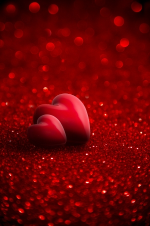 two red hearts with glitter for background of Valentine day の写真素材