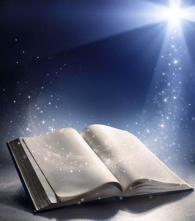 Open Bible with the wind of God s word の写真素材
