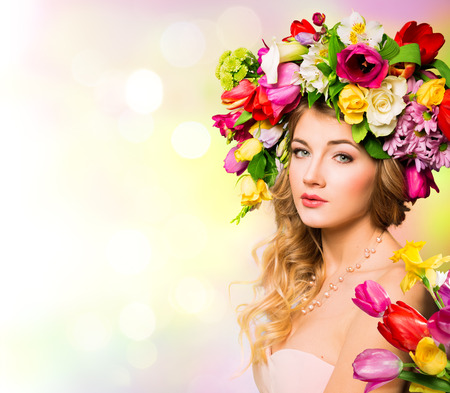 Spring woman portrait hairstyle with flowersの写真素材