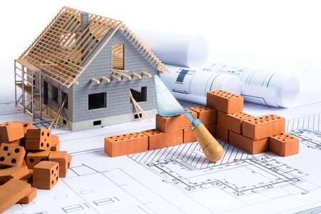 house in construction  project with brick and blueprintの写真素材