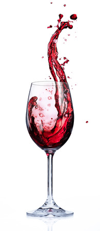 Red Wine Splashing In Glassesの写真素材
