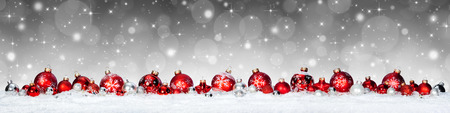 Christmas Banner - Red Spheres On Snowの写真素材
