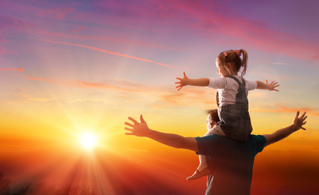 Fathers Day Theme - With Daddy Daughter At Sunsetの写真素材