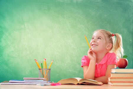 Little Student Thinking In Classroomの写真素材