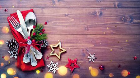 Vintage Silverware With Empty Table And Christmas Decorationの写真素材