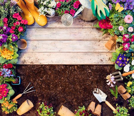 Gardening Frame - Tools And Flowerpots On Wooden Table And Dirtの写真素材