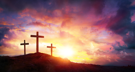 Crucifixion Of Jesus Christ At Sunrise - Three Crosses On Hillの写真素材
