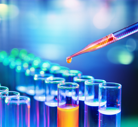 Pipette Dropping A Sample Into A Test Tubeの写真素材