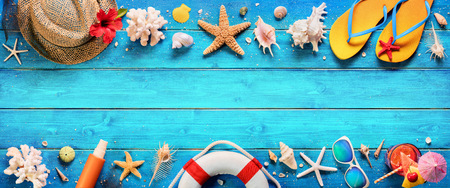 Beach Accessories On Blue Plank - Summer Holiday Bannerの写真素材